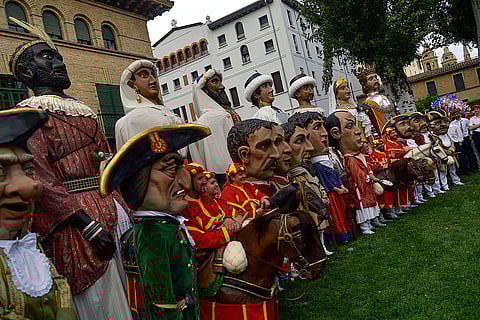 San Fermin Giants Comparsa poses for a photo